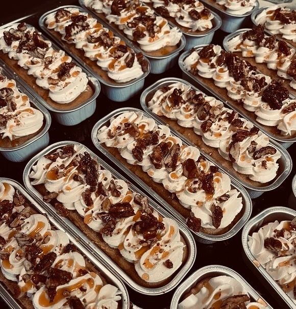 Butter pecan mini loaf cakes with caramel drizzle and candied pecans