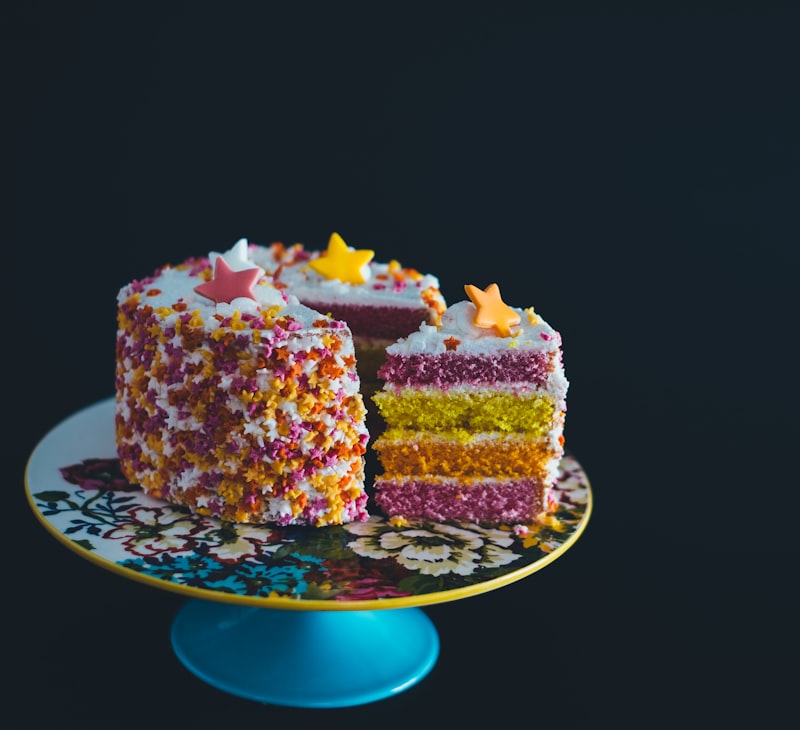 Homemade rainbow layer cake with sprinkles